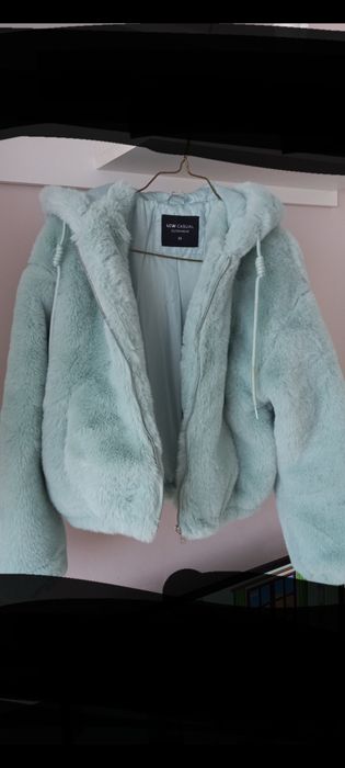 Haina din blana  "verde-mentă",pentru damă.