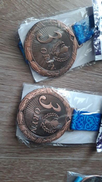 Медаль новая,город