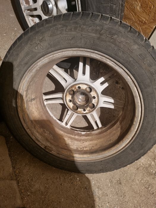 Диск с шиной для ваз пассат