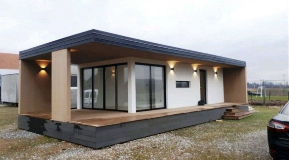 Vând case modulare pe structură metalică învelit cu panouri sandwich