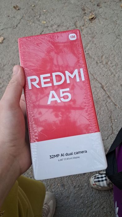 Redmi A5     yangi karobka ochilmagan imeykadan otgan rangi qora  64gb