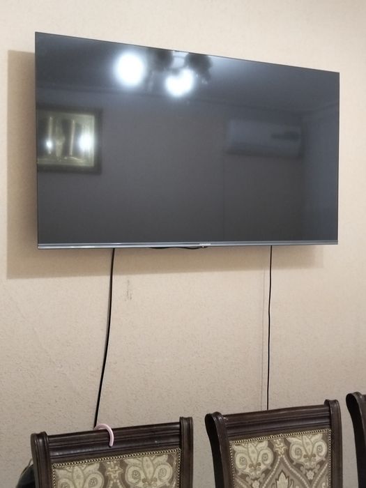 Televizor Premer 55tali holati pashti yengi