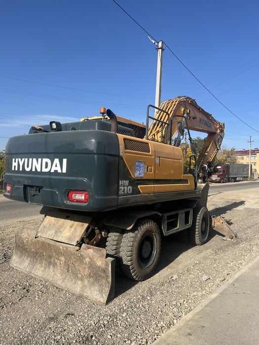 Колесный Эксковатор HW 210