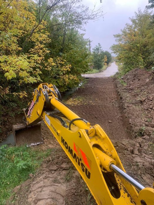 Buldoexcavator cilindru camioneta  de inchiriat Zarnesti/Brasov