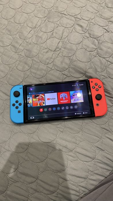 Nintendo Switch Oled + 2 игри и кейс