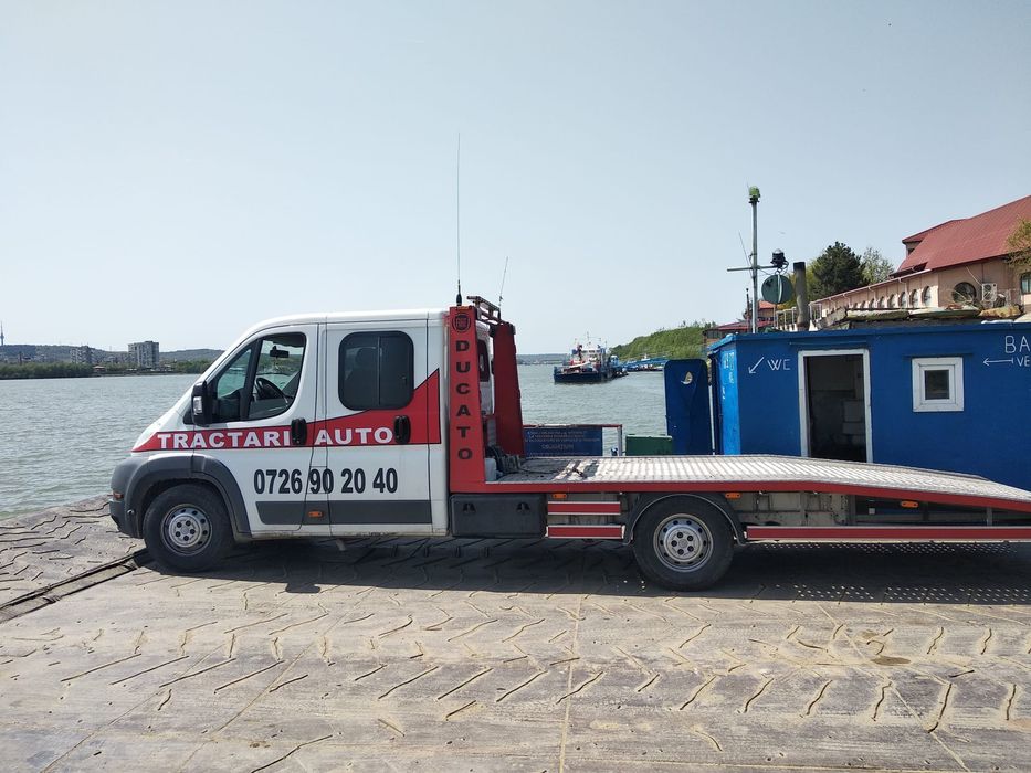 Tractari auto,platforma auto,autoutilitare utilaje agricole