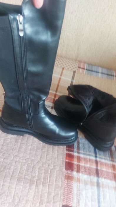 Новые женские сапоги