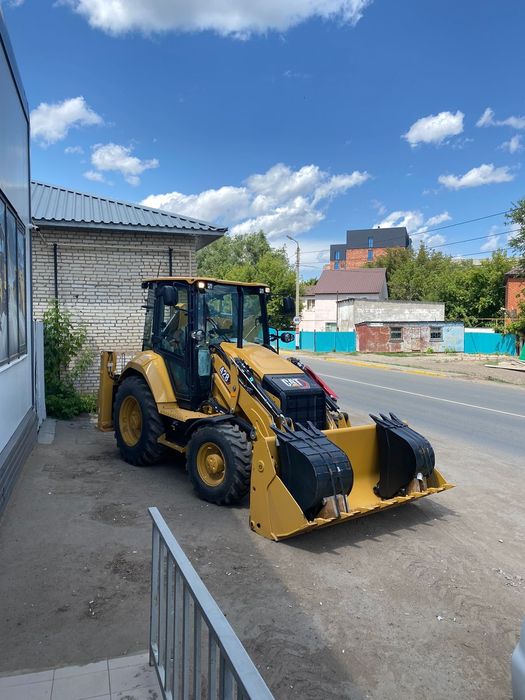 Экскаватор погрузчик Caterpillar 428 сборка Англия