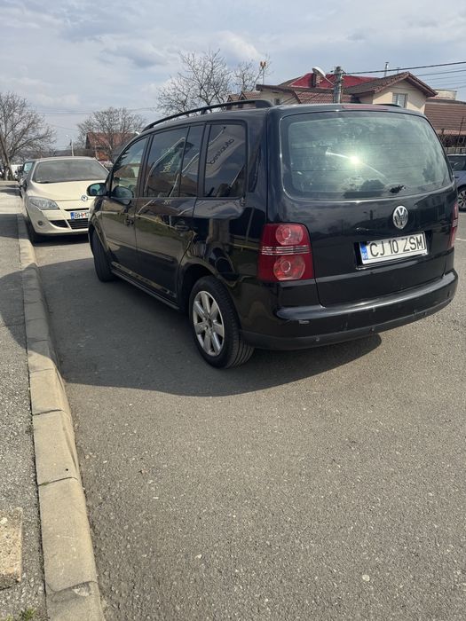 Vând touran DSG sau schimb