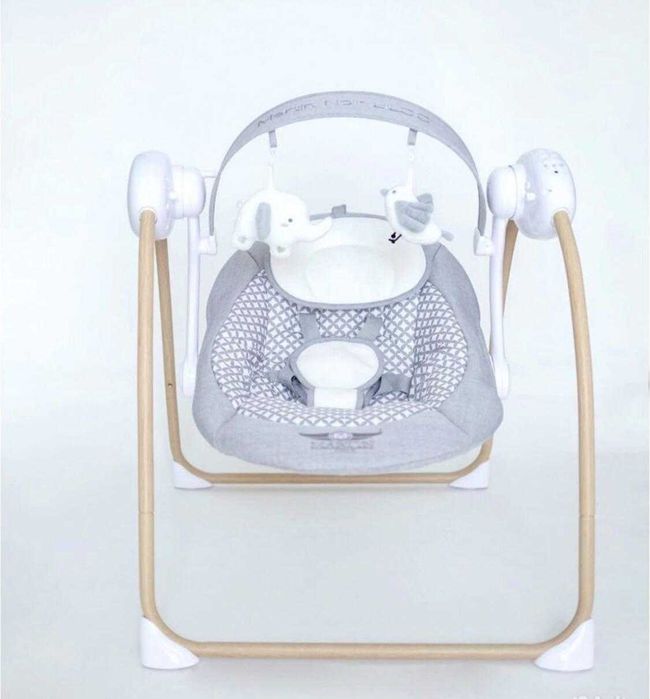 Детская эл-качалка Есть 5 реж.скорости Есть место для флеш карты.