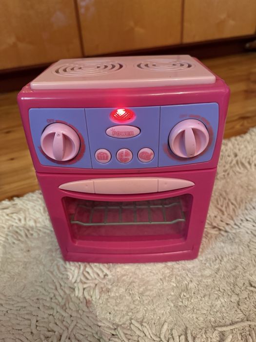 Продаётся игрушка плита с посудкой
