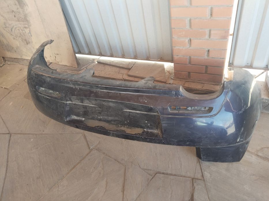 Бампер задний Мазда 3