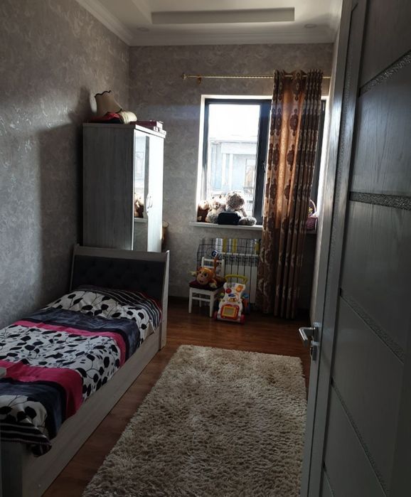 Xasanboy postdan 900 metr kirganda 1.35 sotu 4 xona 2 etajli kattedj