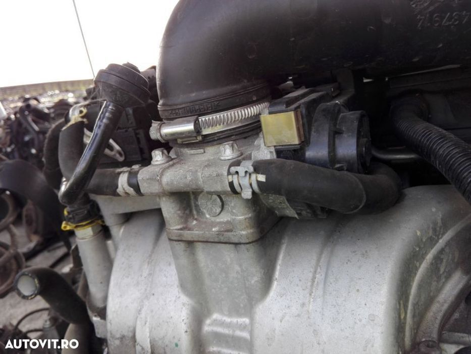 Clapeta acceleratie Opel Astra H 1.6 benzina din 2003
