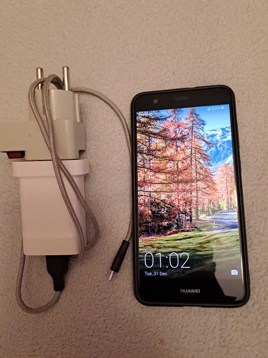 телефон huawei p10 lite .