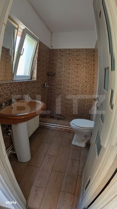 Casa cu 2 camere si mansarda ,plus bucatarie de vara .