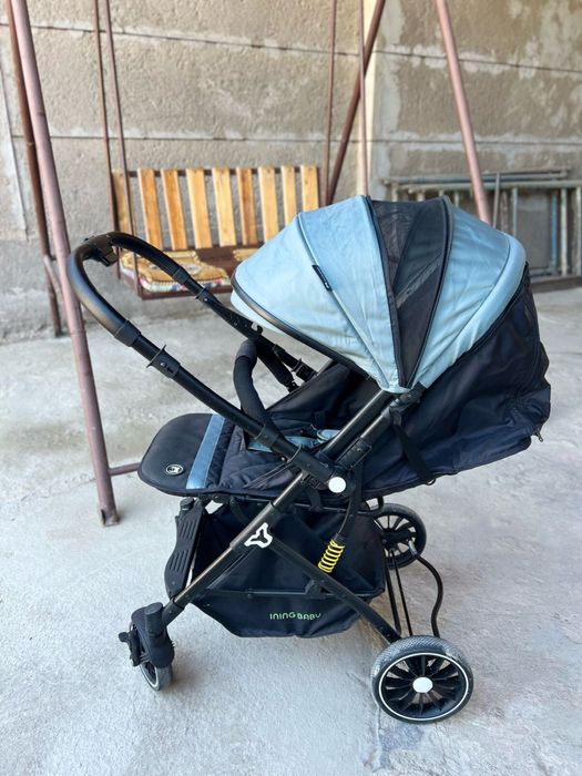 Коляска ининг баби