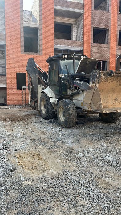 Экскаватор-погрузчик 2011 г.в