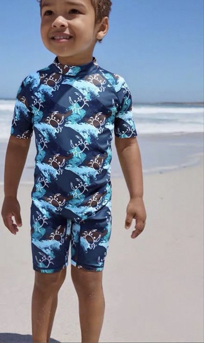 Купальники next детские