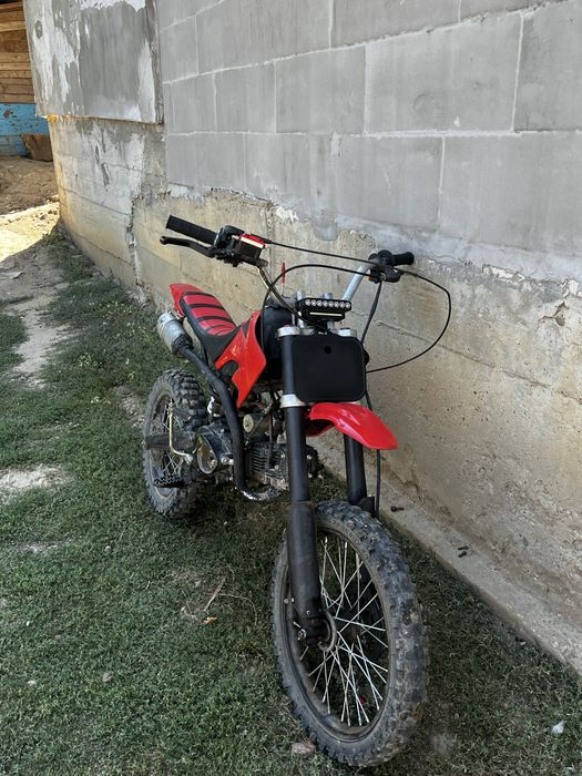 Vand cross kxd de 125cc (CITITI DESCRIEREA)