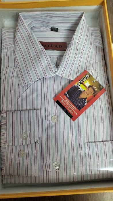 Рубашки мужские новые