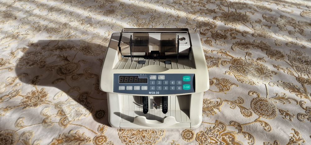 Счетная машинка для денег