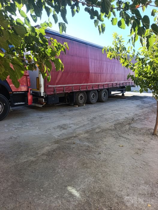 Fura HOWO a6 pritsepni bilan