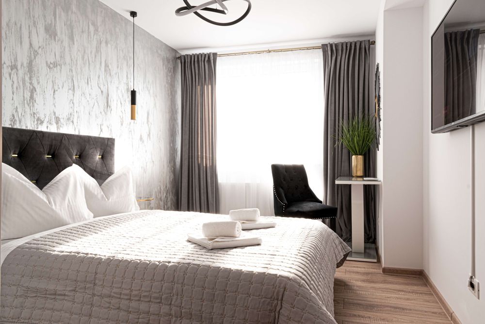 Proprietar închiriez apartament cu 2 camere vis a  vis de Mall Coresi