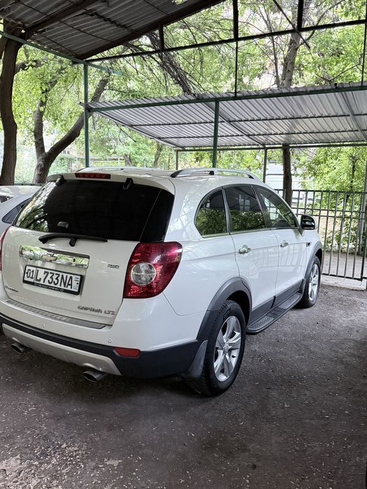 Captiva 2 молочая 2012 года 94000 пробег в хорошем состоянии.