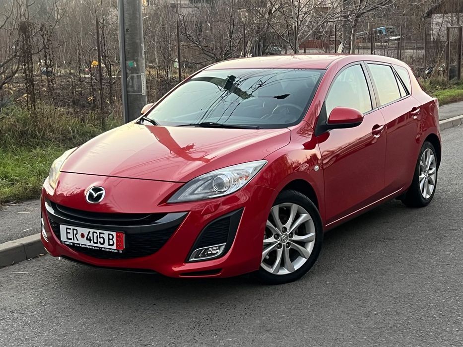 Mazda 3 2.0i / 116.500 km / Bi-Xenon Adaptiv /Bose/ Încălzire /Senzori