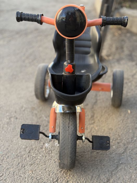 Трехколесный велосипед.