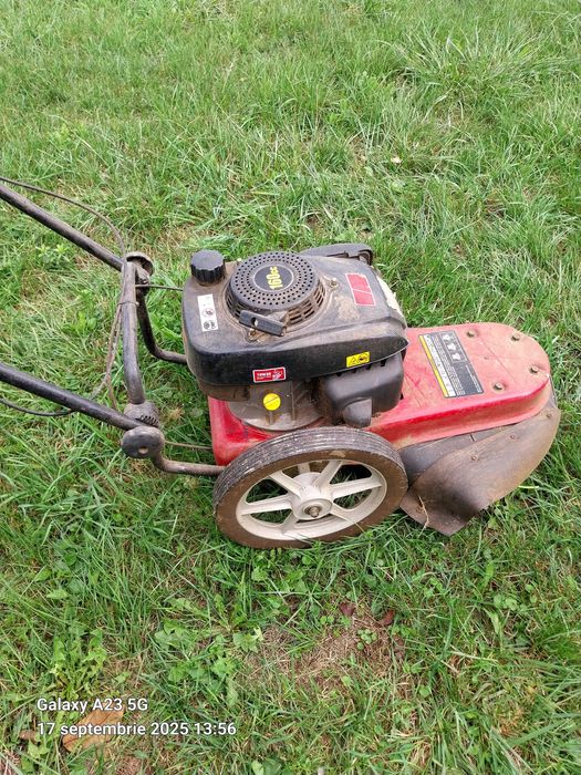 Motocoasa  pe doua roti cu fir