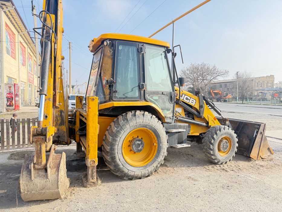 Экскаватор погрузчик JSB