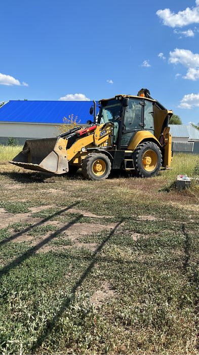 Услуги Экскаватор погрузчик