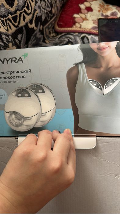 Электрический молокоотсос