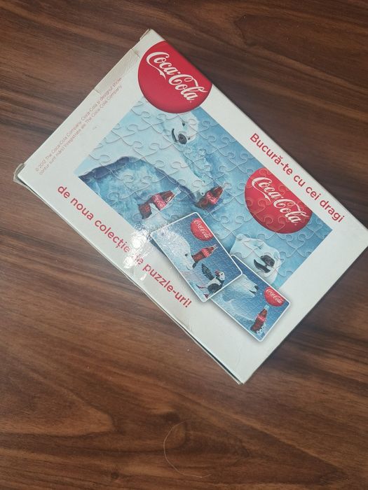 Vând puzzle coca cola