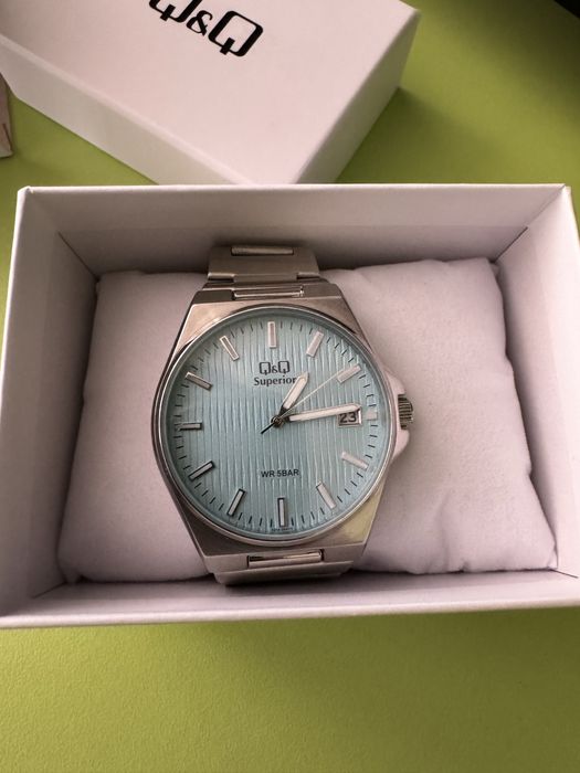 Часовник оригинален  QиQ