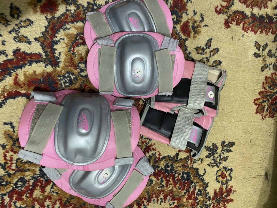 Роликовые коньки