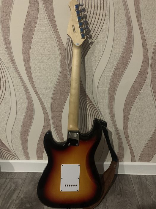 Электрогитара новая