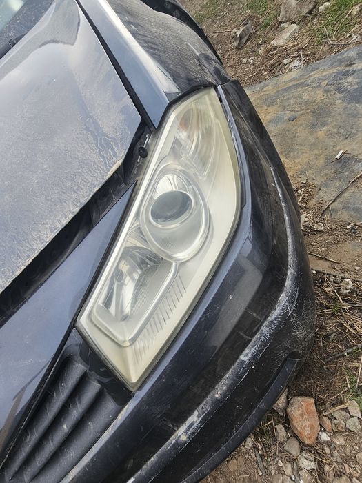 Far stânga dreapta cu lupa Renault megan 2 an 2005