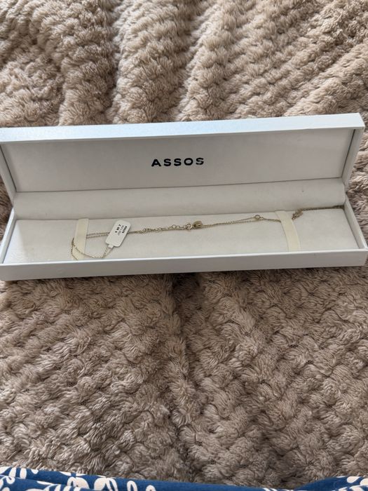 Золотой браслет(шумешек) ASSOS