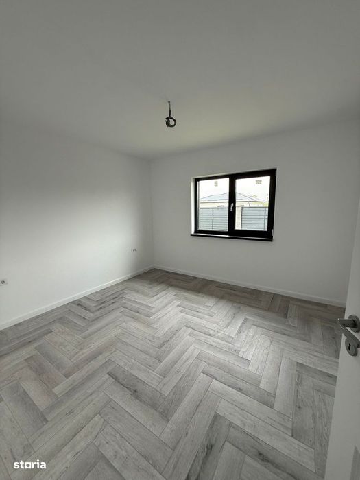 Casa pe parter cu 4 camere , incalzire in pardoseala , teren 400 mp