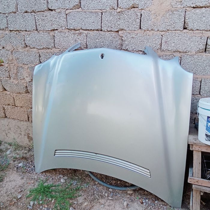 Капот от 210 рест 2001г