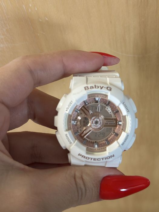 Два часовника baby G