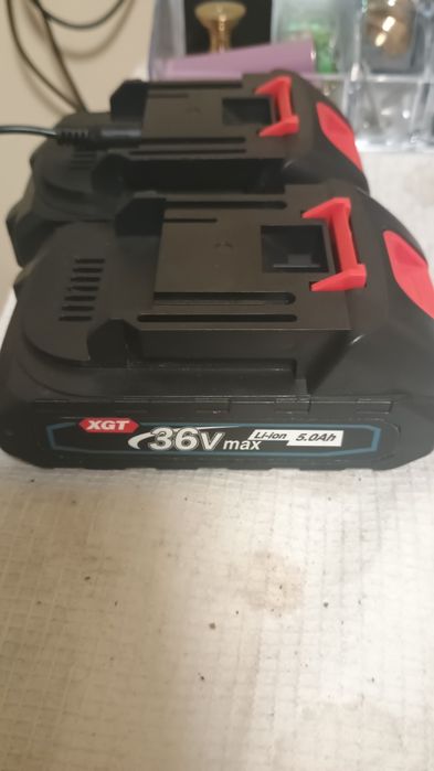 Baterii + încarcător noi