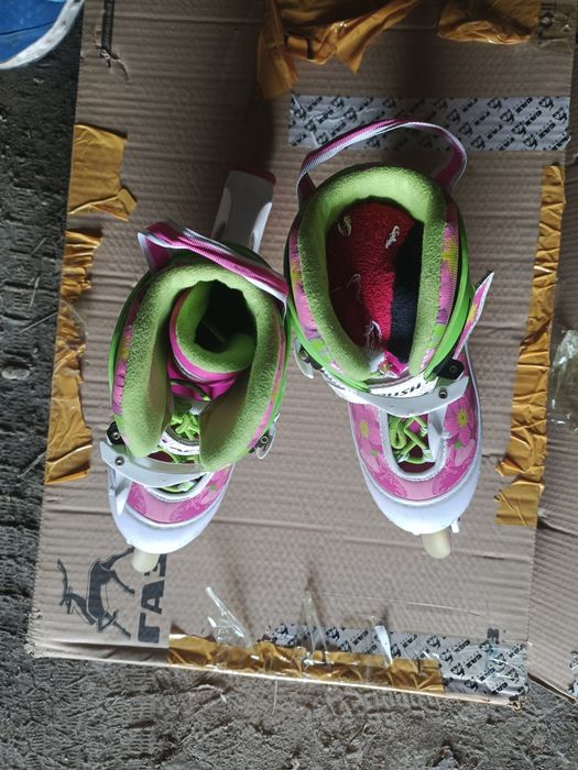 Роликовые коньки