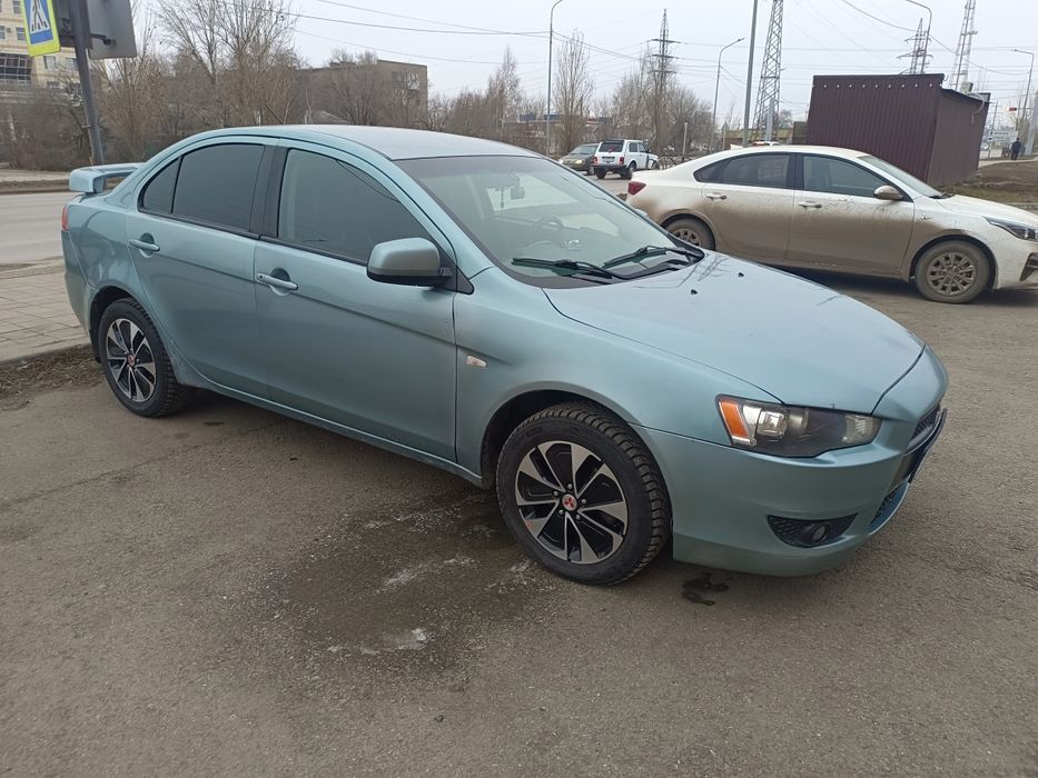 Митсубиси Лансер Х