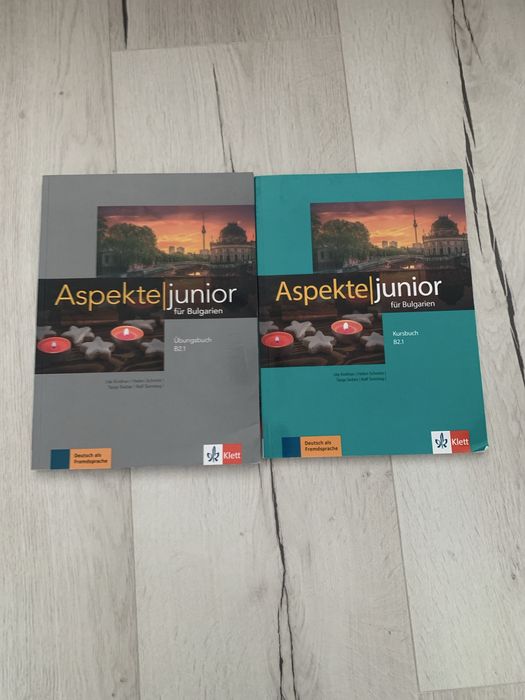 Учебник и учебна тетрадка по немски език В2.1 на Клет.