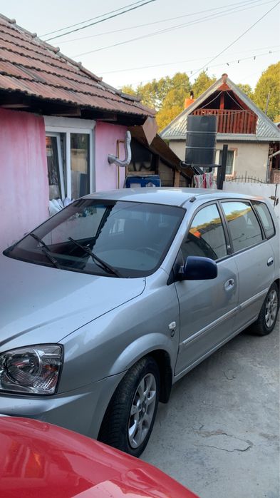 Vand sau schimb cu cross Kia carens  2.0 diesel 143cp