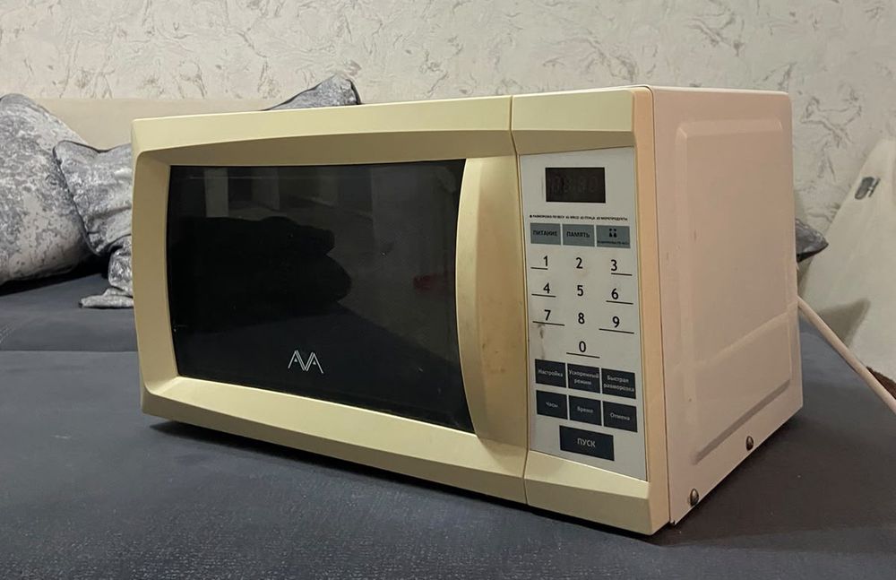 Продам мкроволновую печь "AVA"